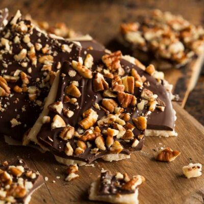 Chocolate Toffee Nut Squares on a cutting board