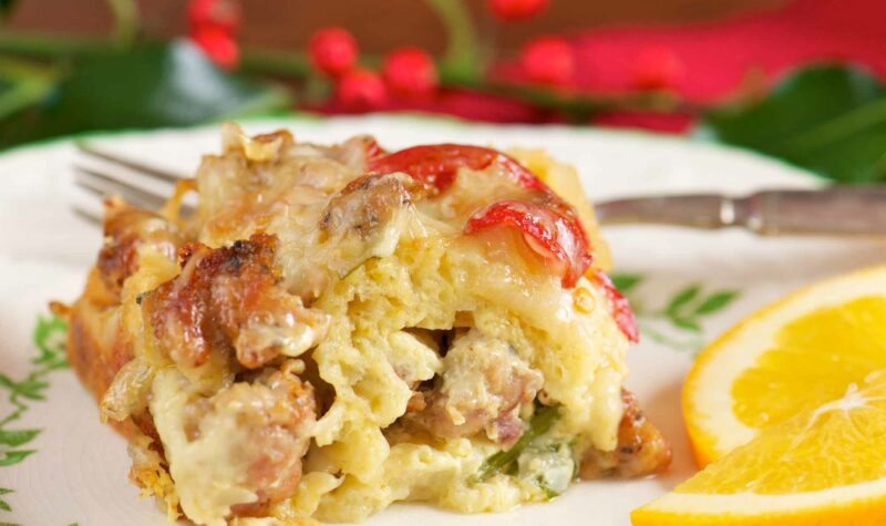 A closeup of a bacon and sausage breakfast casserole